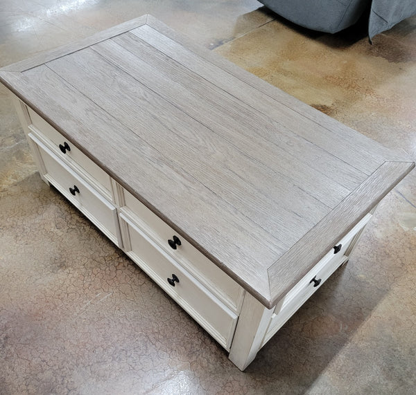 Bolanburg Pastoral Charm Castered Coffee Table with 4-Drawer Lift Top Two-tone