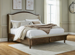 Sturlayne King Upholstered Panel Bed Brown