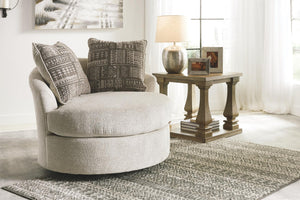 Soletren Fabric Swivel Accent Chair Stone