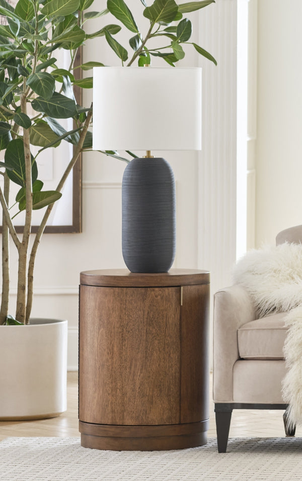 aspenhome caden round chairside table in spiced caramel