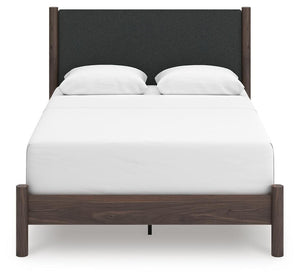 Pamytta Queen Upholstered Panel Bed Brown