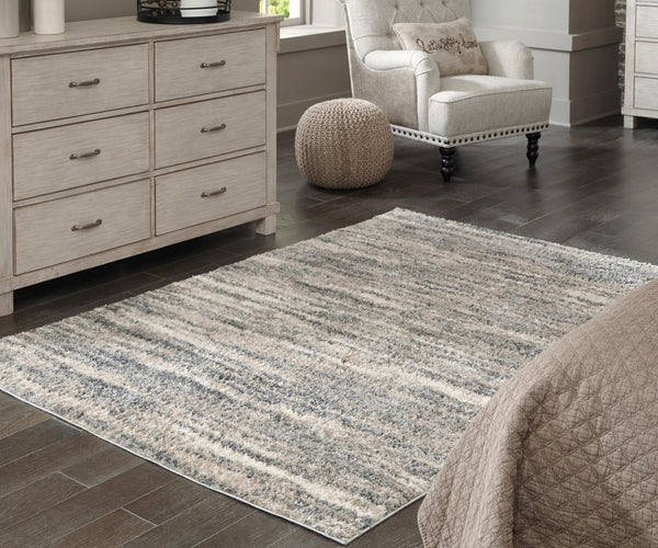 Ashley Gizela Large Rug Ivory/Beige/Gray Signature Design