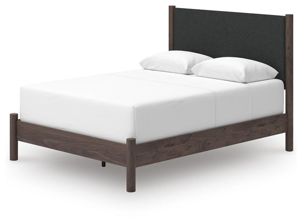 Pamytta Queen Upholstered Panel Bed Brown
