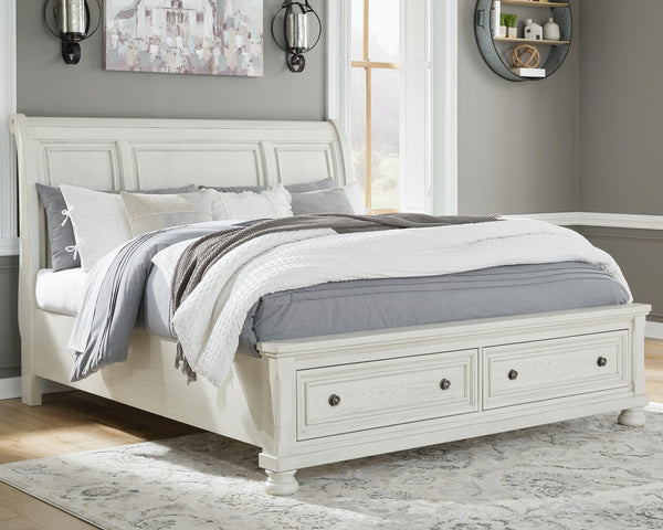 Robbinsdale Queen Sleigh Bed with 2-Drawers of Storage Antique White