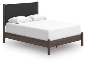 Pamytta Queen Upholstered Panel Bed Brown