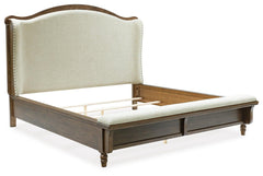 Sturlayne King Upholstered Panel Bed Brown