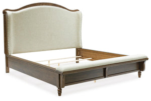 Sturlayne King Upholstered Panel Bed Brown