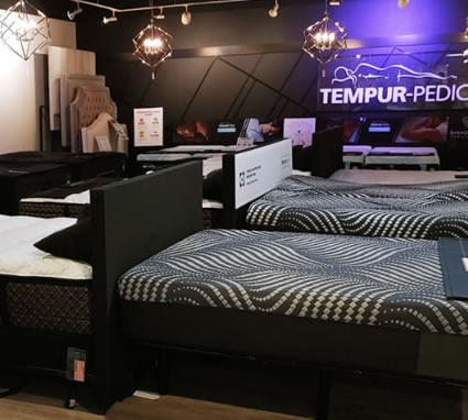 Premium mattresses at Hudson's Furniture Ormond Beach FL showroom